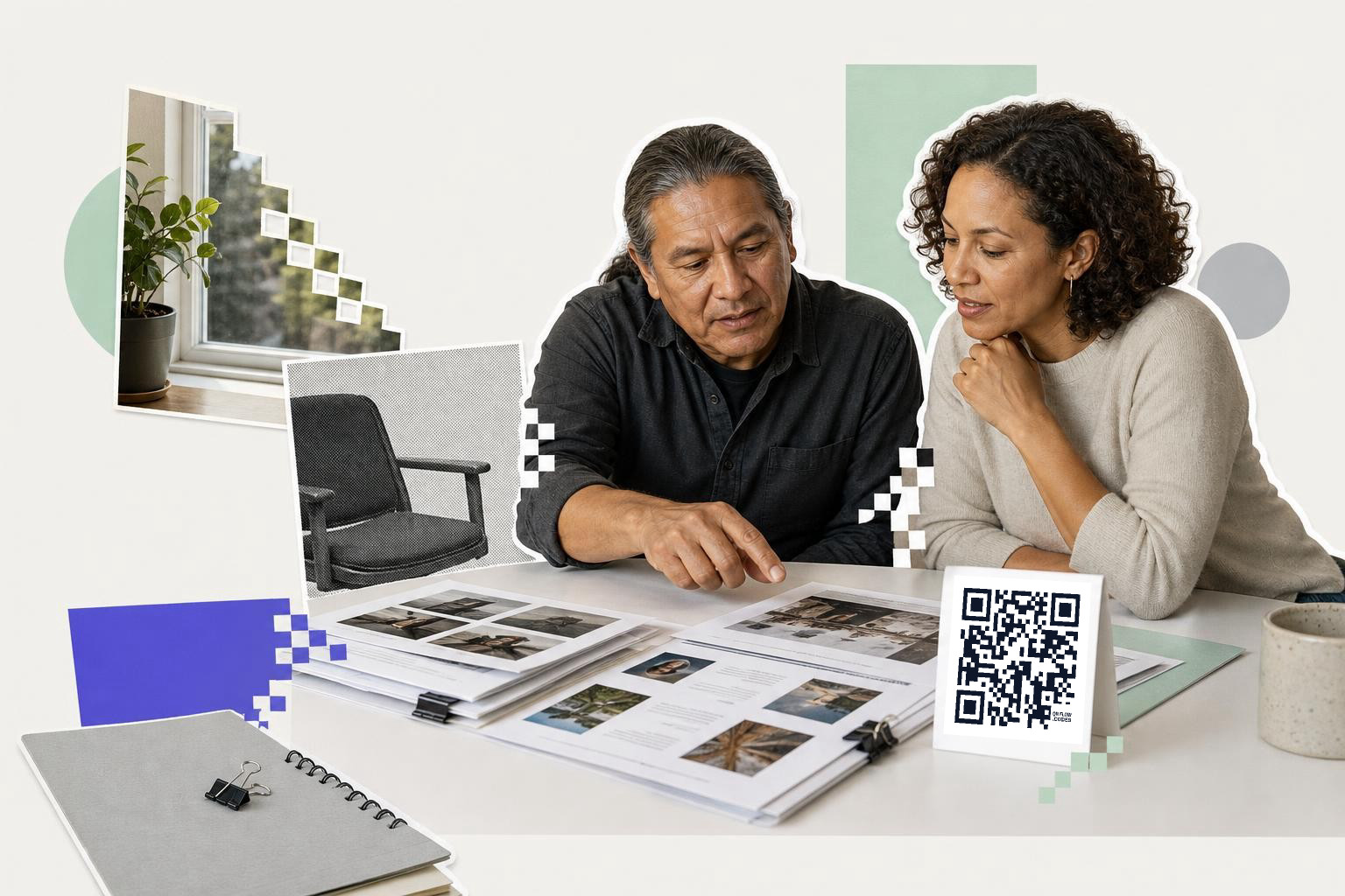 Two individuals discuss a portfolio on a table, with a printed card featuring a QR code beside them in a modern setting.