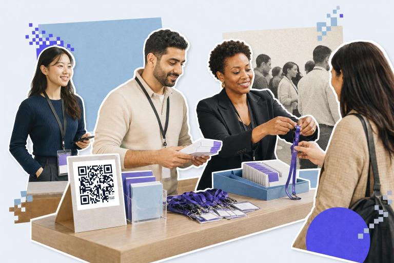 People at a registration desk with a QR code for Eventbrite on a card, exchanging lanyards.
