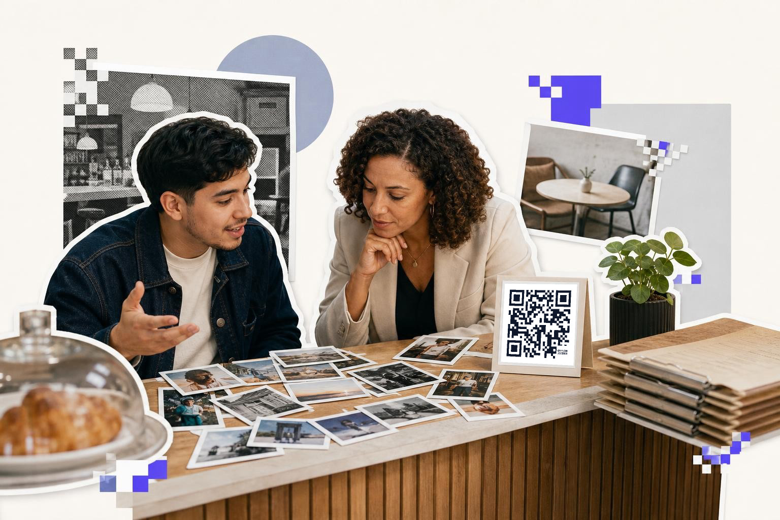 Two people looking at photographs on a table with a QR code card and a plant nearby.
