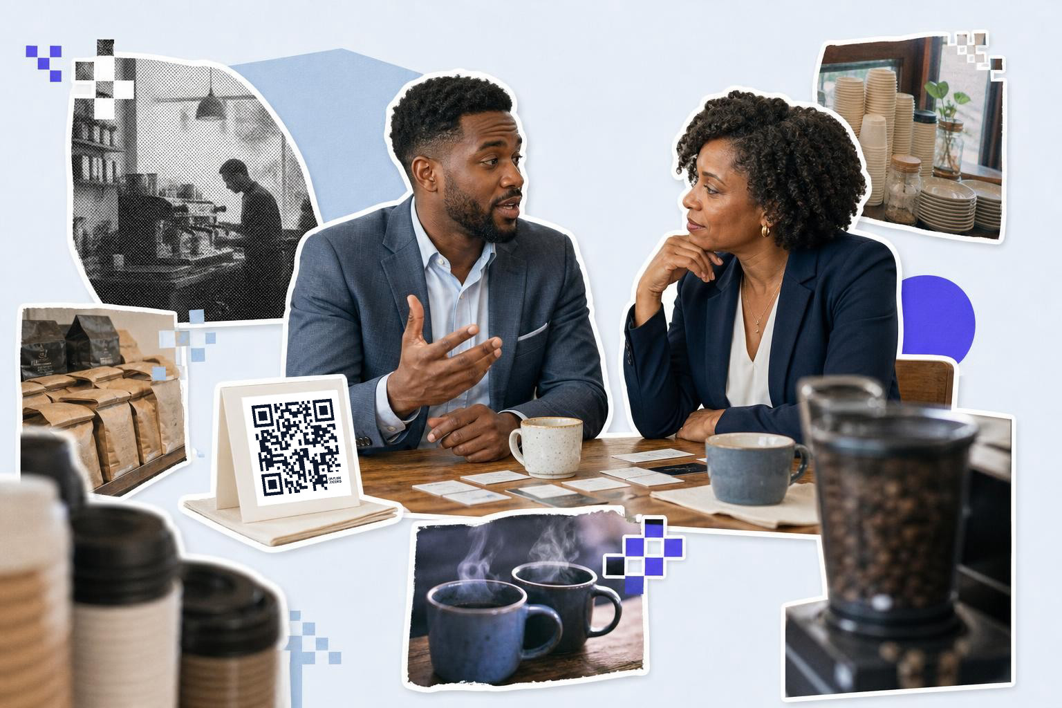 Two people in suits converse at a table with coffee cups and a QR code sign.