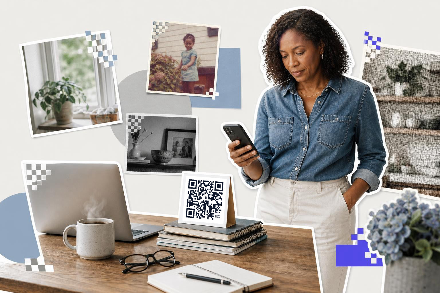 Woman in denim shirt looks at phone near table with laptop, coffee, glasses, and QR code card.