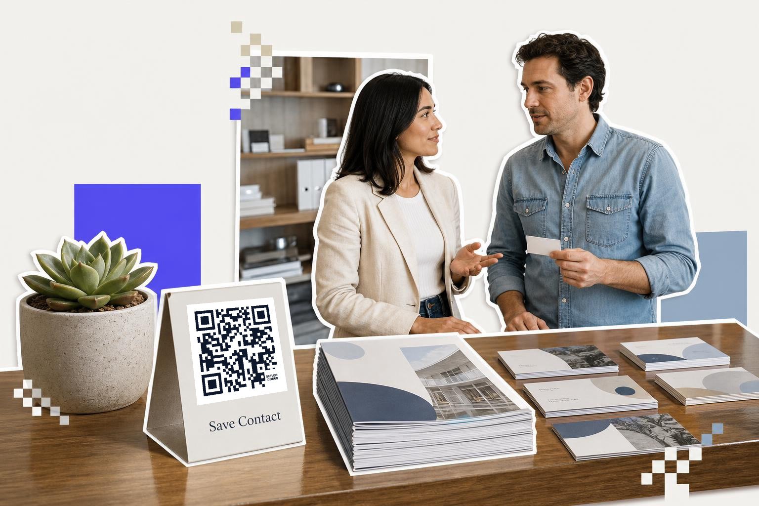 A woman and a man discuss business cards at a table with printed materials and a QR code display in a modern office setting.