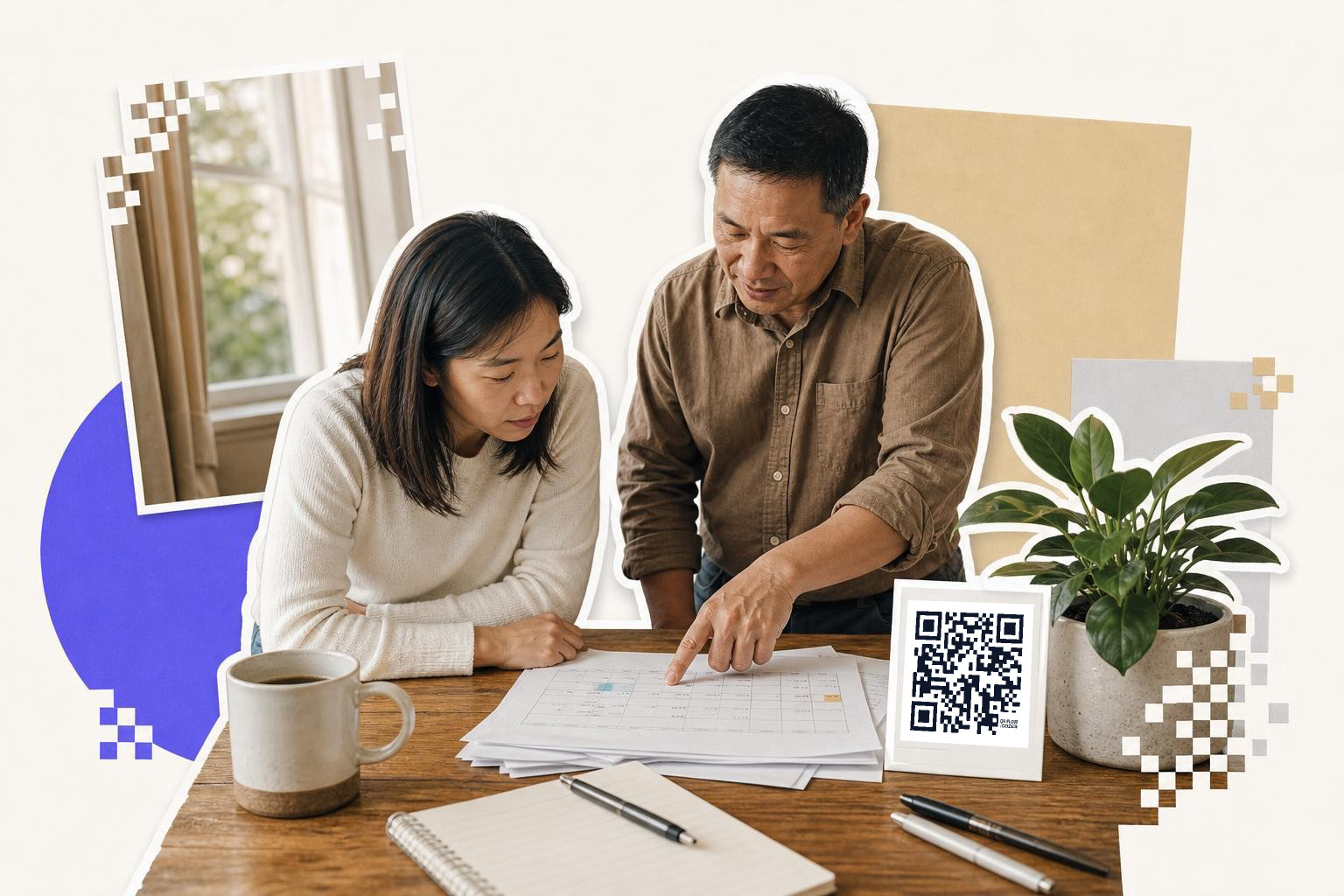 Two people reviewing documents at a table with a QR code card and a plant nearby.