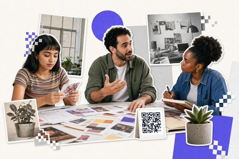 Three people discussing design ideas at a table with a QR code card nearby