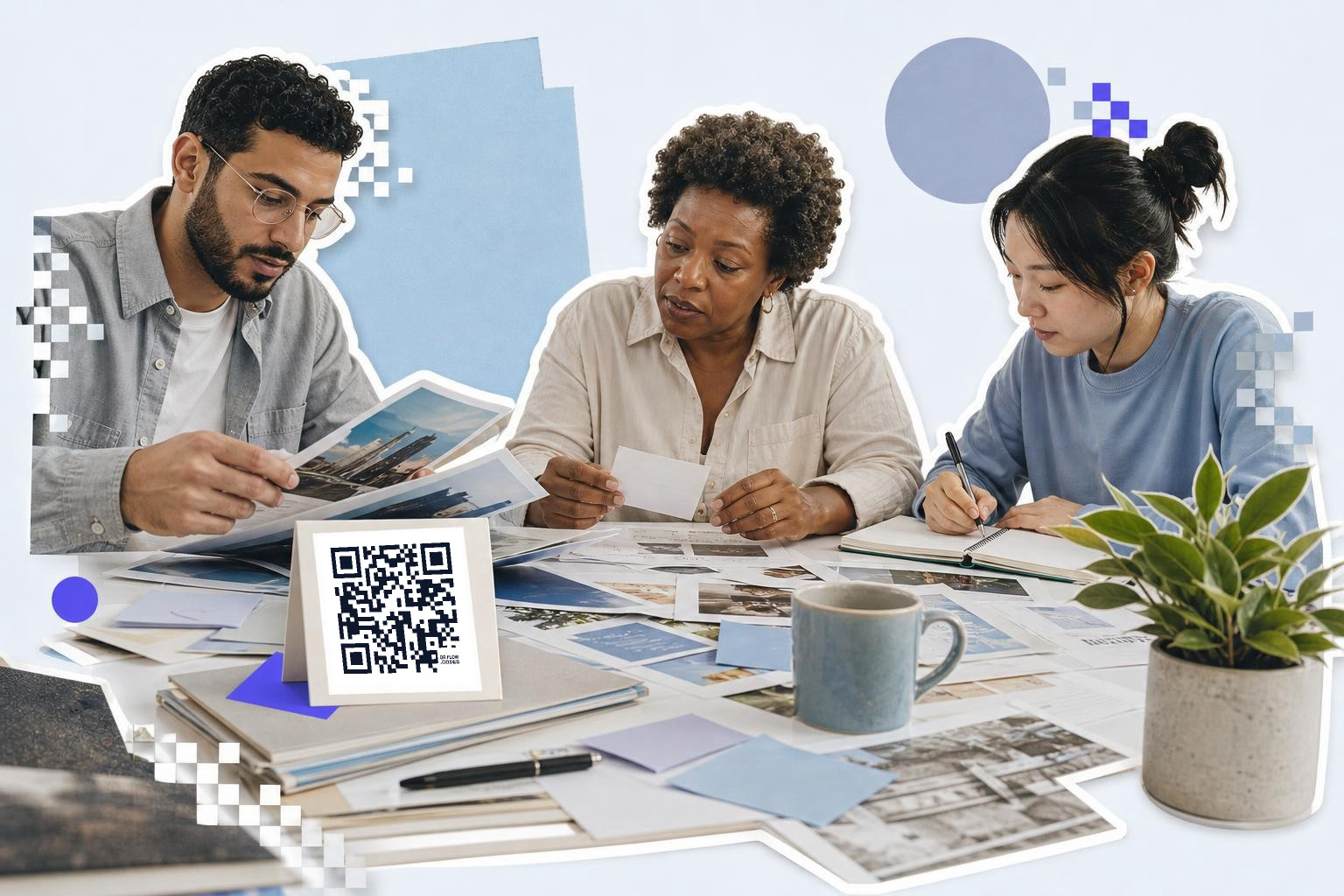 Three people sitting at a table reviewing documents with a QR code on a card in front.