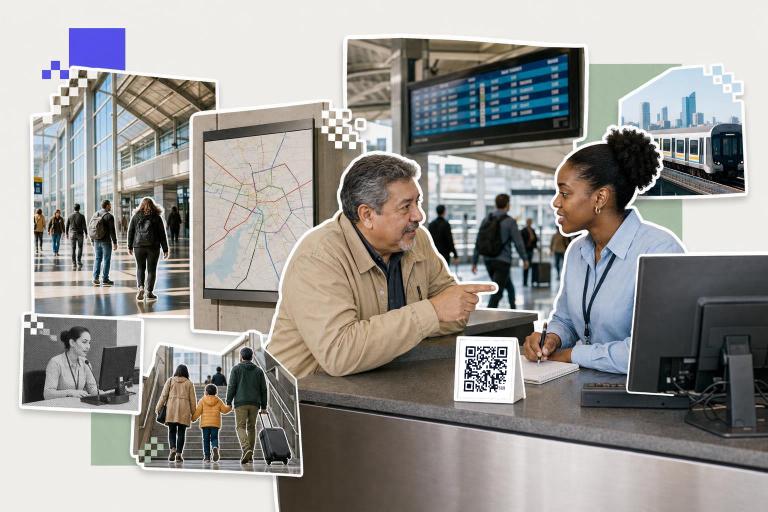 Man and woman at information desk discussing QR code placement in transit systems with map and train images