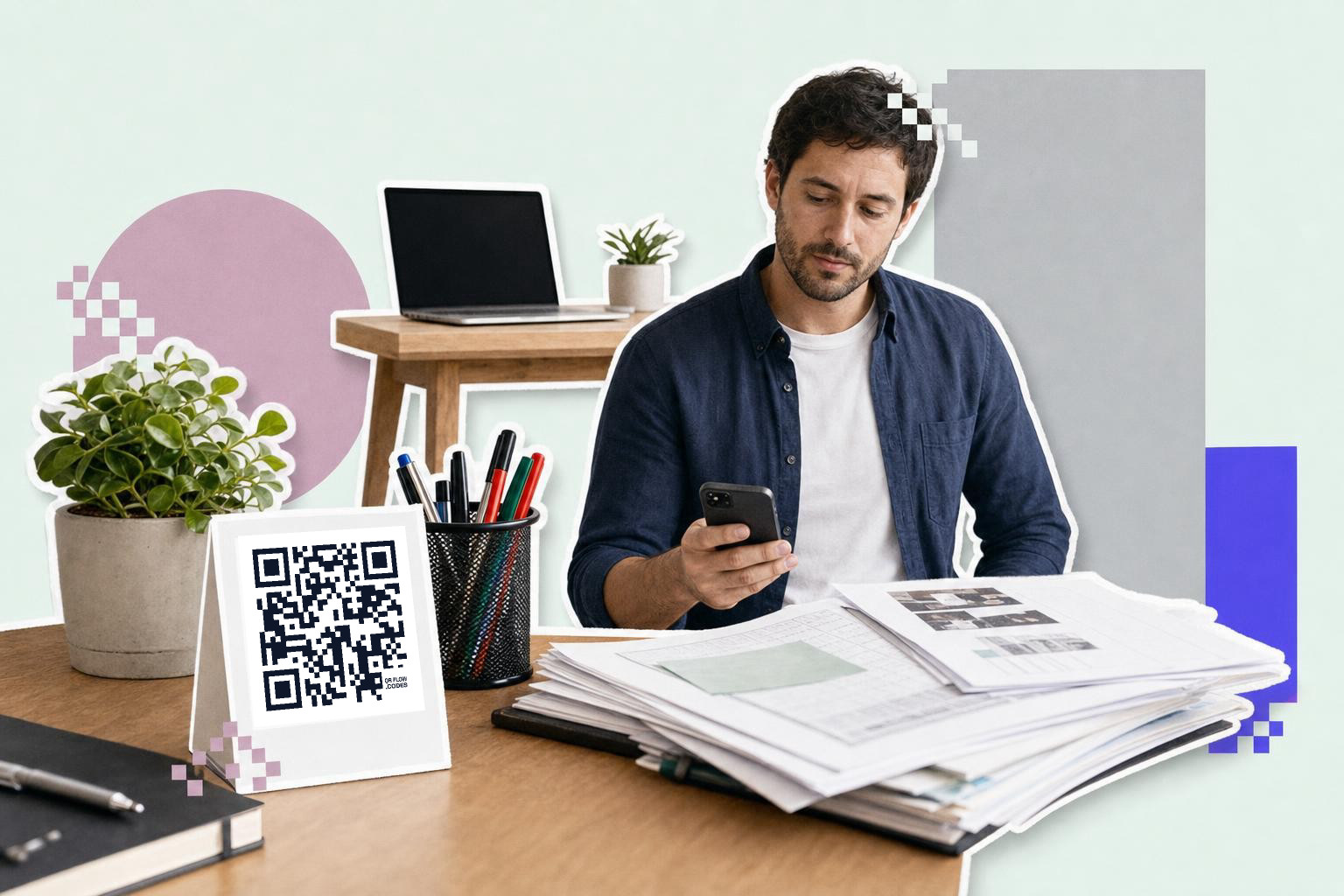Man at desk with phone, QR code card, and papers, learning how to make a QR code for a PDF.