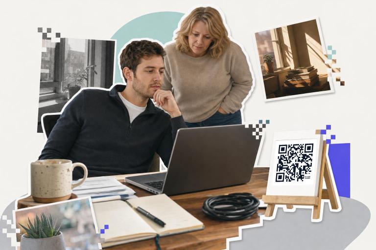 Two people read a laptop at a desk while a card made through the qr code mcp server stands on an easel